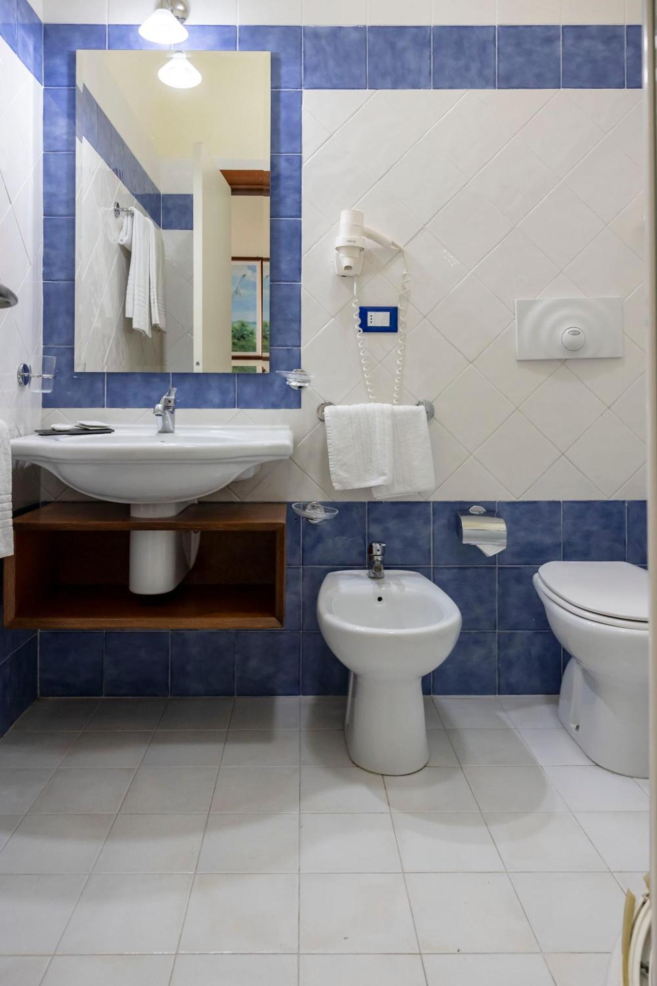 סנט'איזידורו Blu Salento Village חדר תמונה